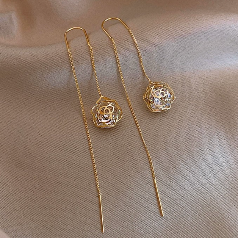 Dangling Sphere Earrings in Gold