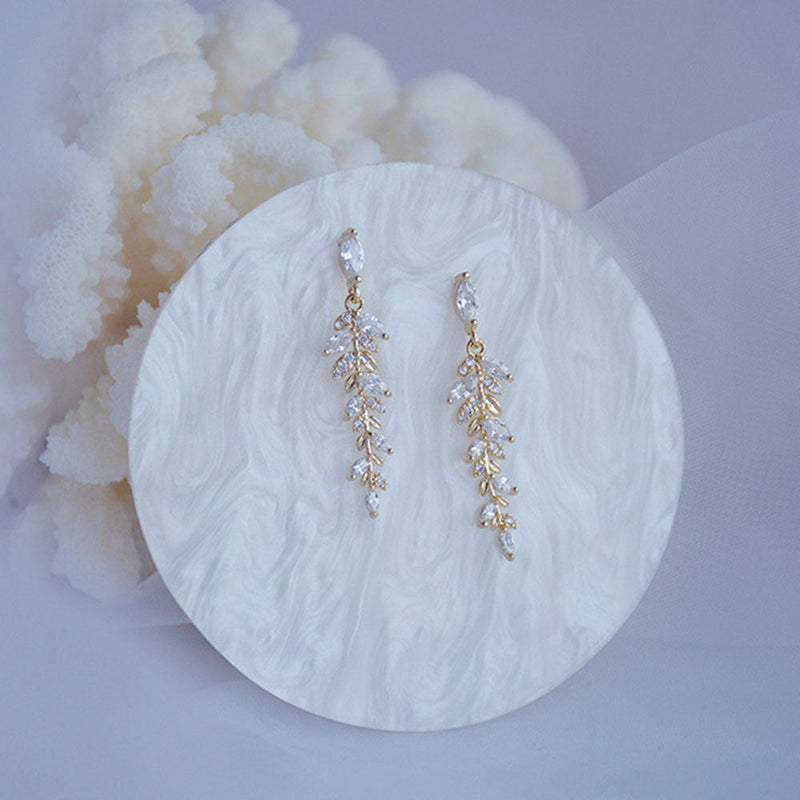 Luxury Dangling Earrings with Crystals in Gold