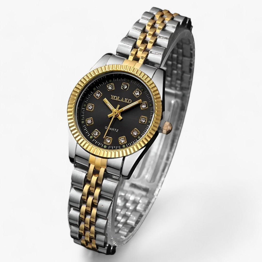 Elegant round watch with gold bracelet